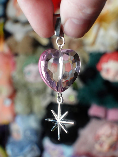 heart-shaped glass(es) pendant