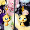 littlest pet shop earrings (yellow/orange)